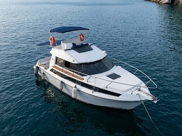 Midas anchored on the blue sea